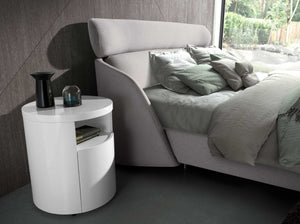 White wooden bedside table