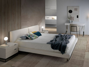 White faux leather bed