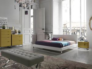 White faux leather bed
