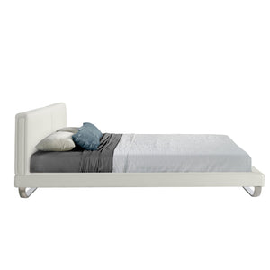 White faux leather bed