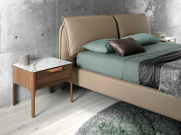 Walnut bedside table with marble-effect glass top and interior lighting