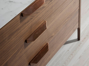 Walnut chest of drawers with marble-effect glass top