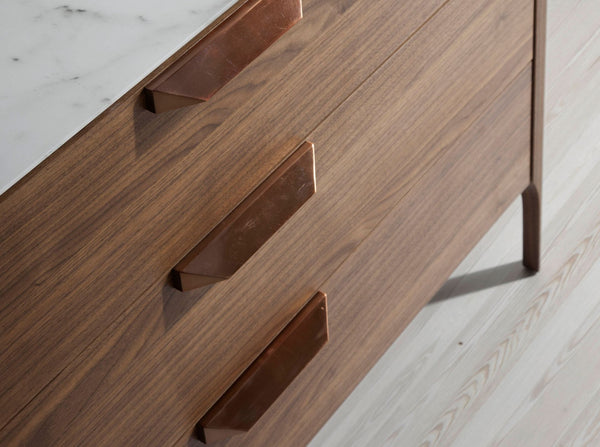 Walnut chest of drawers with marble-effect glass top
