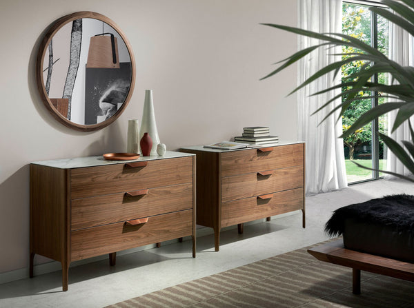 Walnut chest of drawers with marble-effect glass top