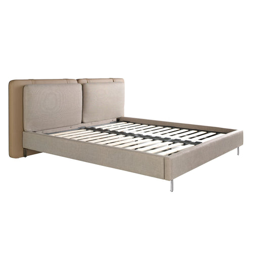 Bed in mink fur and gray fabric