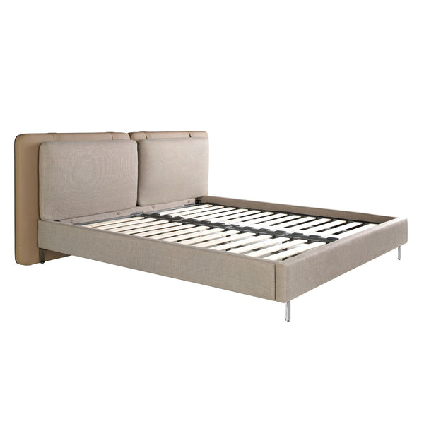 Bed in mink fur and gray fabric