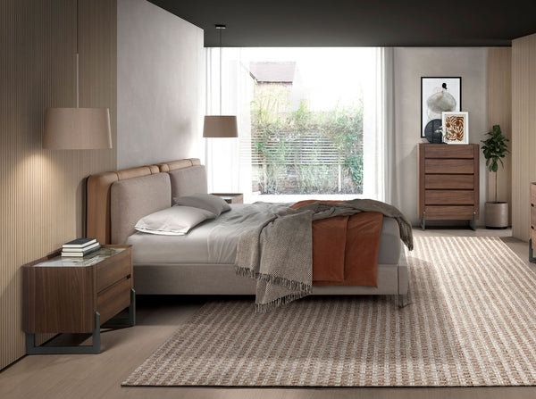 Bed in mink fur and gray fabric