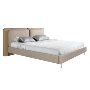 Bed in mink fur and gray fabric