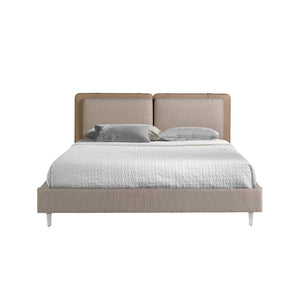 Bed in mink fur and gray fabric