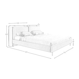 Bed in mink fur and gray fabric