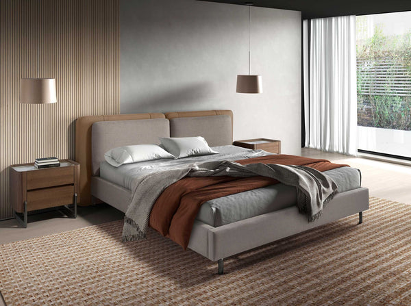Bed in mink fur and gray fabric