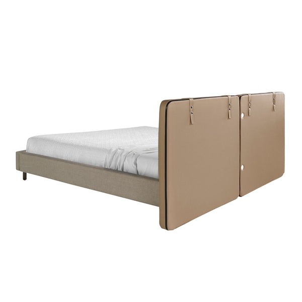 Bed in mink fur and gray fabric