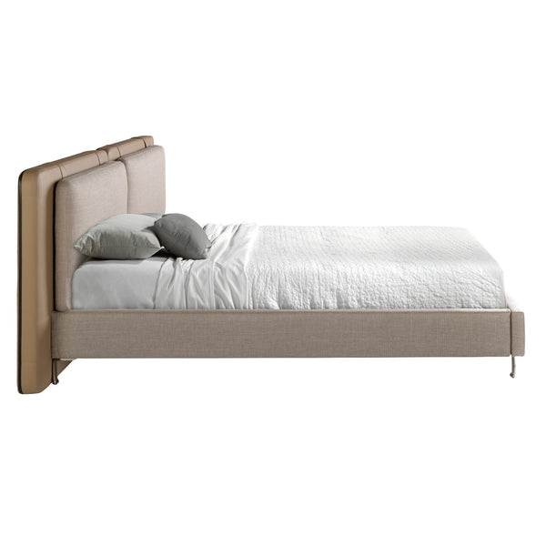 Bed in mink fur and gray fabric