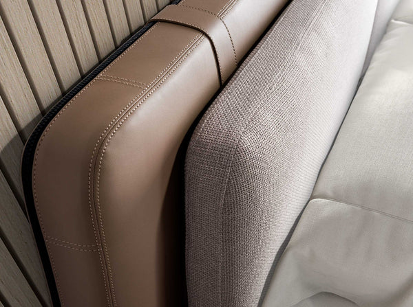 Bed in mink fur and gray fabric