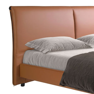 Brown faux leather bed