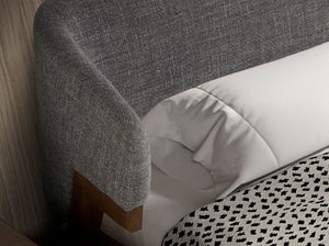 Gray fabric bed