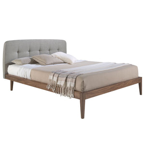 Tufted bed in gray fabric