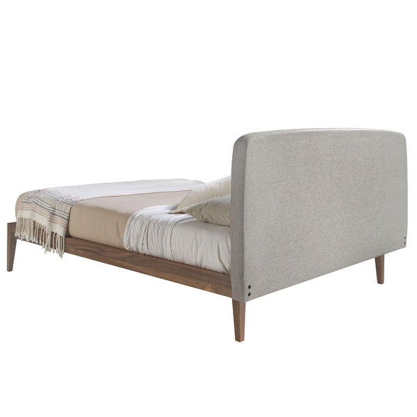 Tufted bed in gray fabric