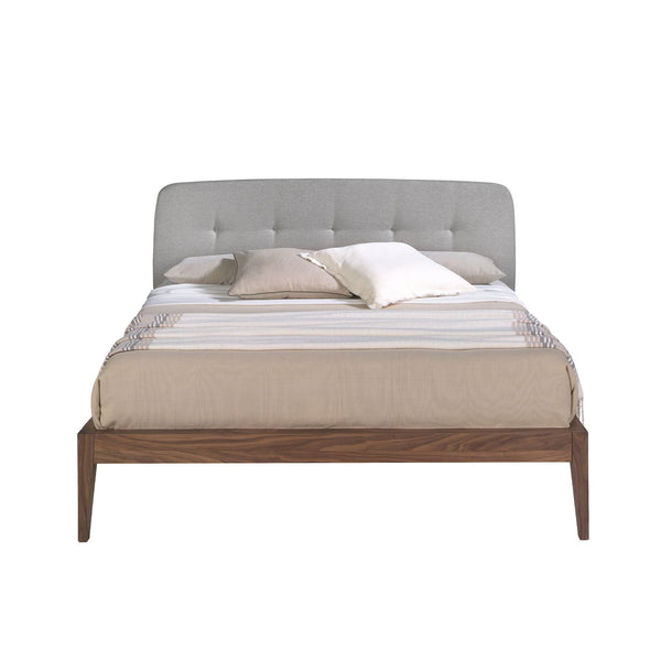Tufted bed in gray fabric