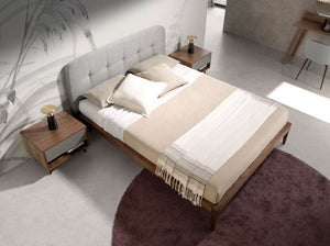Tufted bed in gray fabric