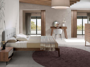 Tufted bed in gray fabric