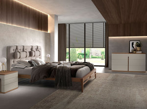 Tufted bed in gray fabric