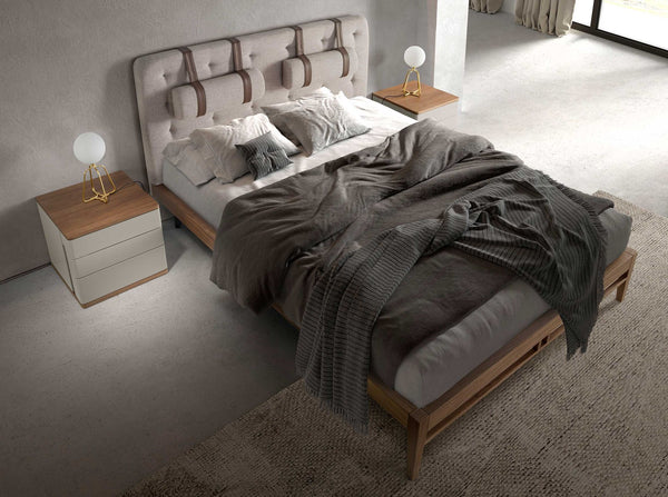 Tufted bed in gray fabric