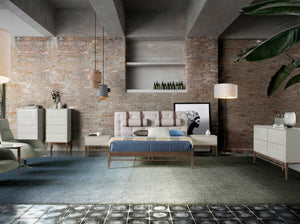 Tufted bed in gray fabric