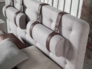 Tufted bed in gray fabric