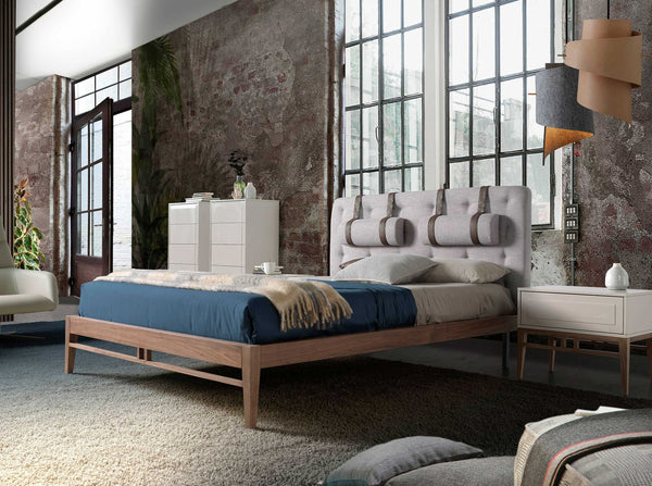 Tufted bed in gray fabric