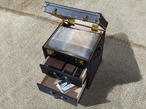 Black leather trunk