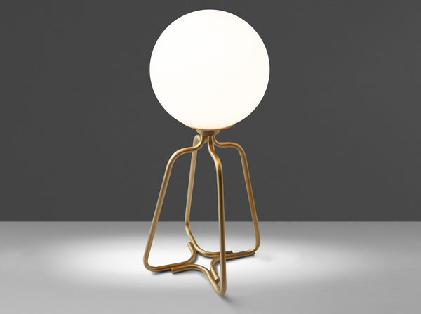 Table lamp in gold steel and white glass