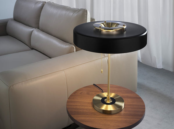 Table lamp in gold aluminum and black aluminum
